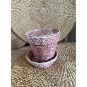 Pink and white ceramic flower pot with saucer candle